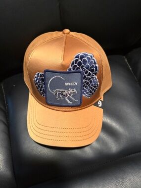 Goorin Bros Navy & Tan Trucker Cap with  embroidered Speedy patch.